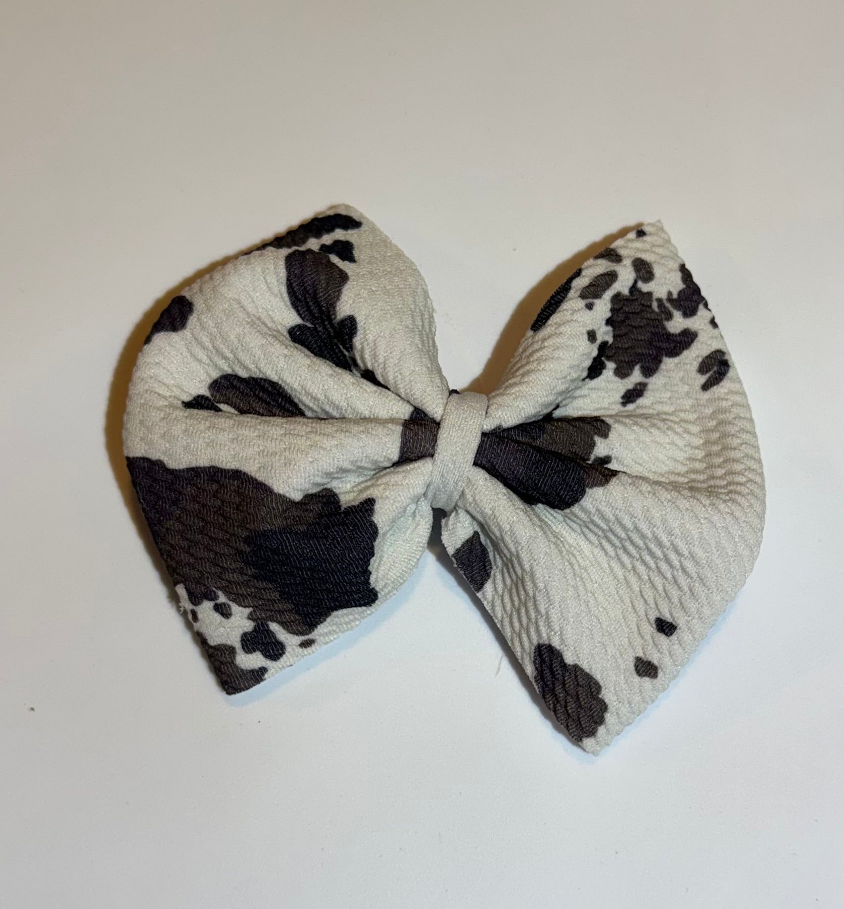 Brown and White Cowhide